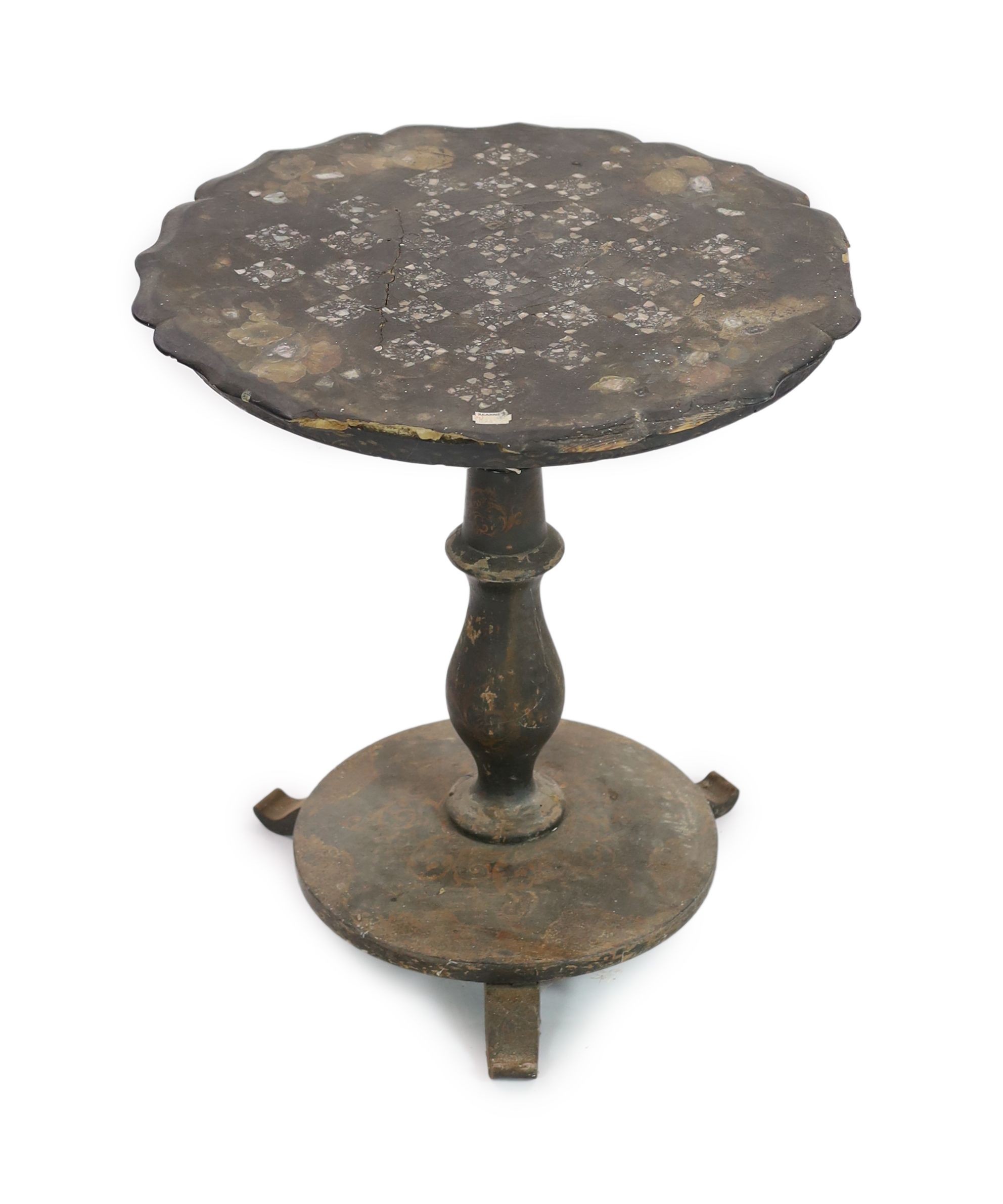 A Victorian papier mache and ebonised wood pedestal games table, 57cm high 52cm diameter